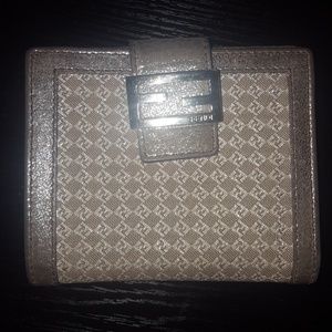 Seasonal collectable FENDI wallet logo embellished
